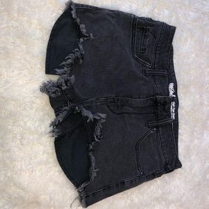 Black ripped shorts